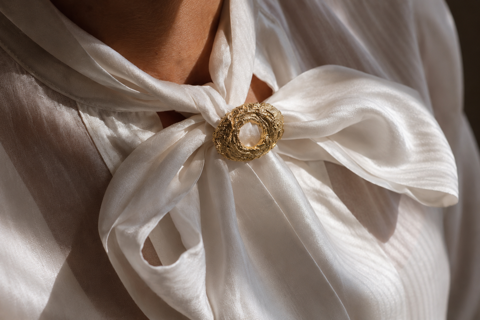 The Art of Layering and the Brooch Renaissance