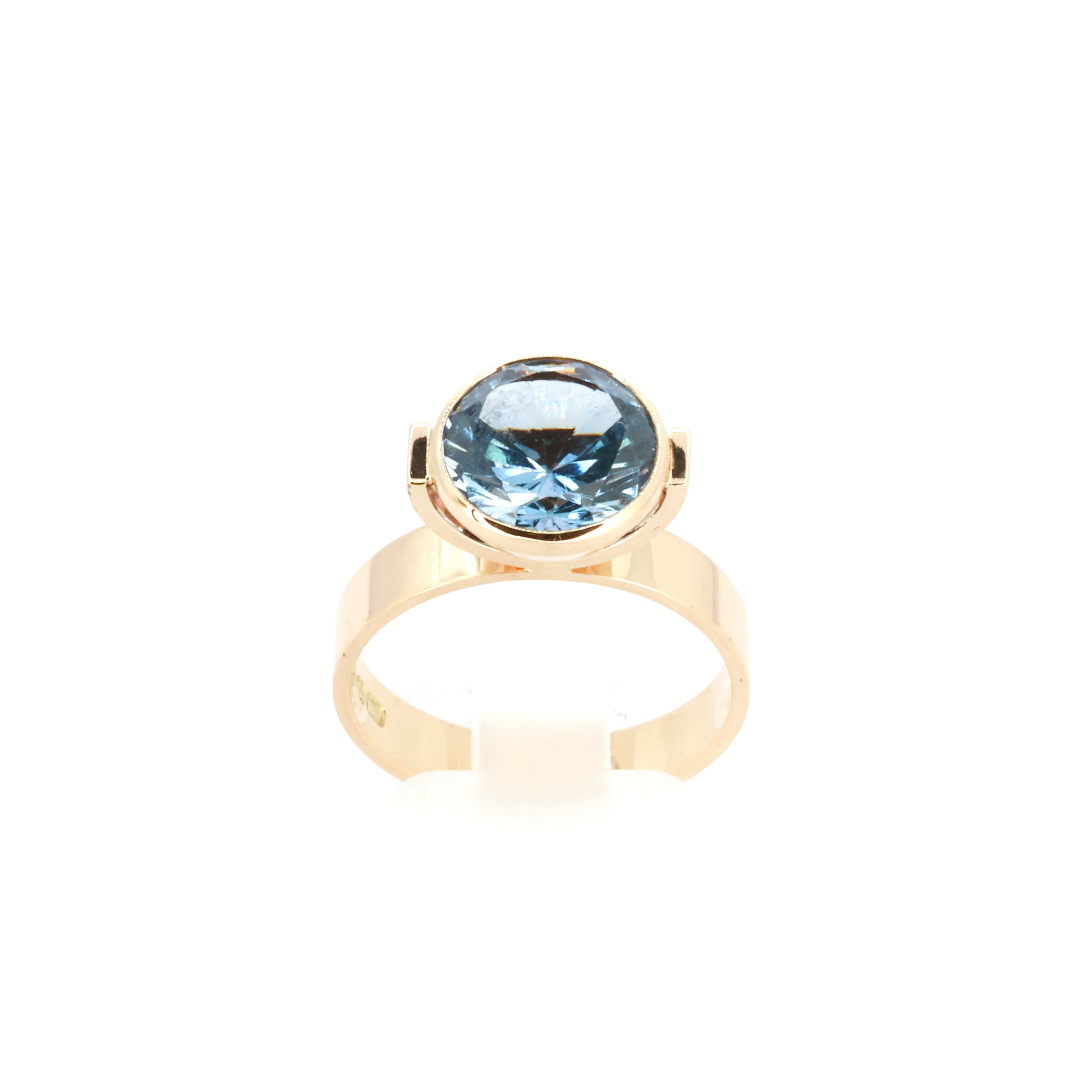 Bezel Set Sky Blue Gold Ring