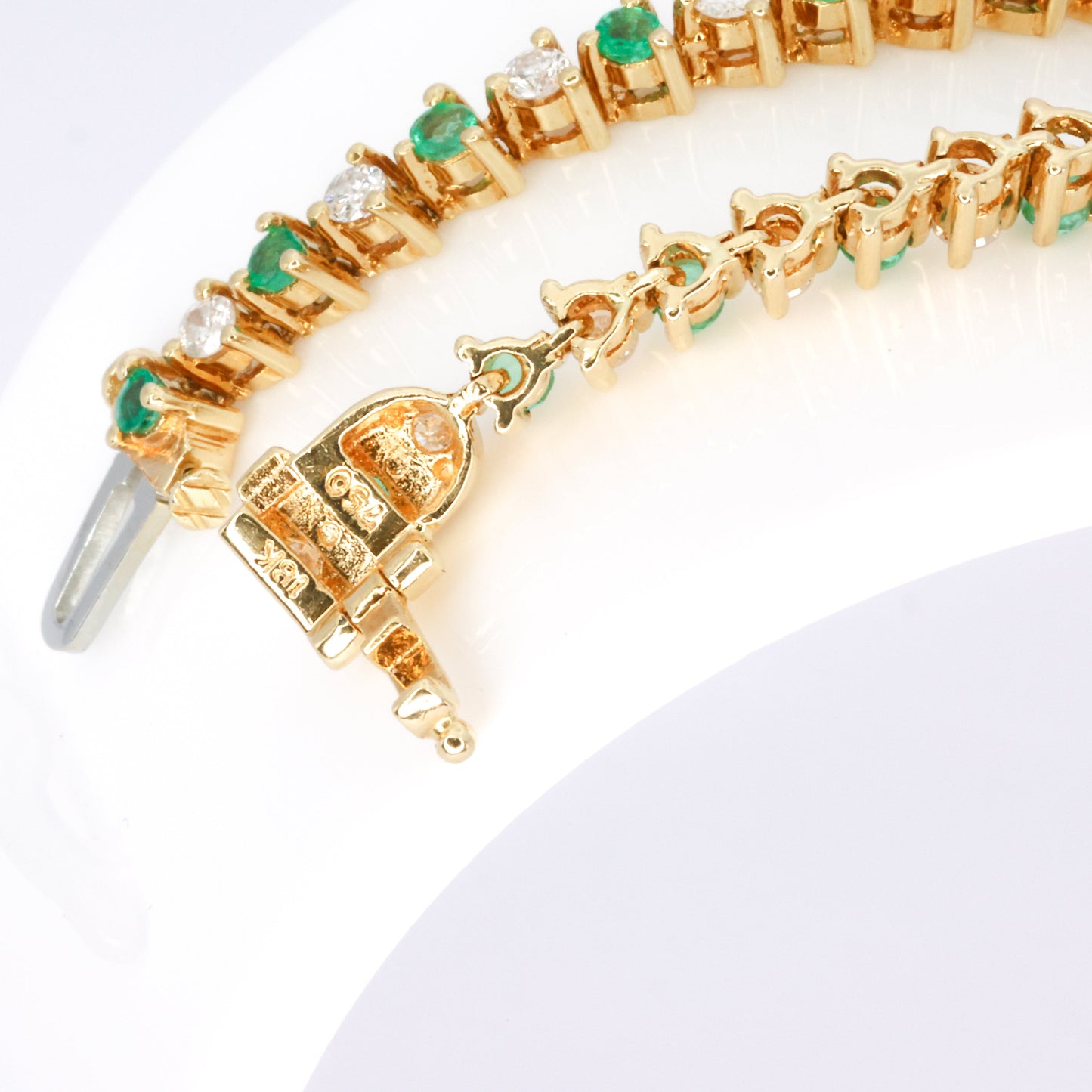 Diamond & emerald tennis bracelet