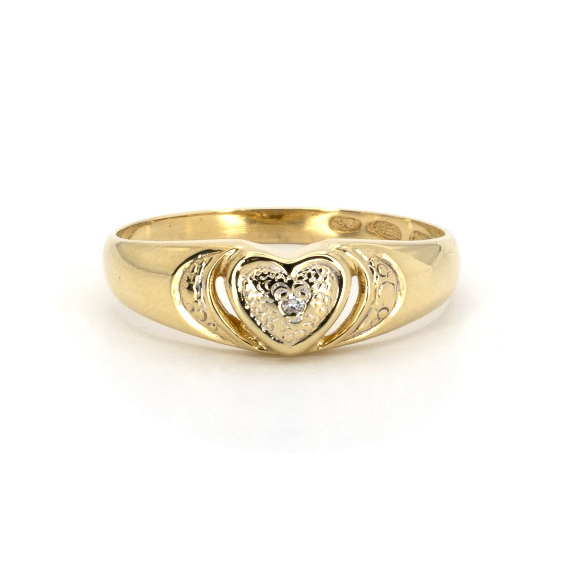 Kultainen timantti-sydänsormus