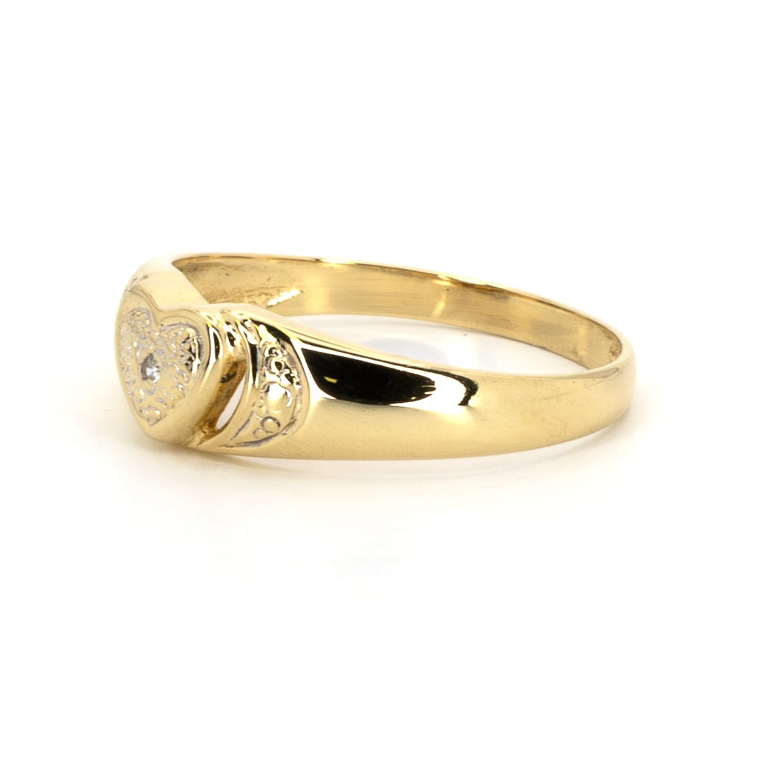 Kultainen timantti-sydänsormus