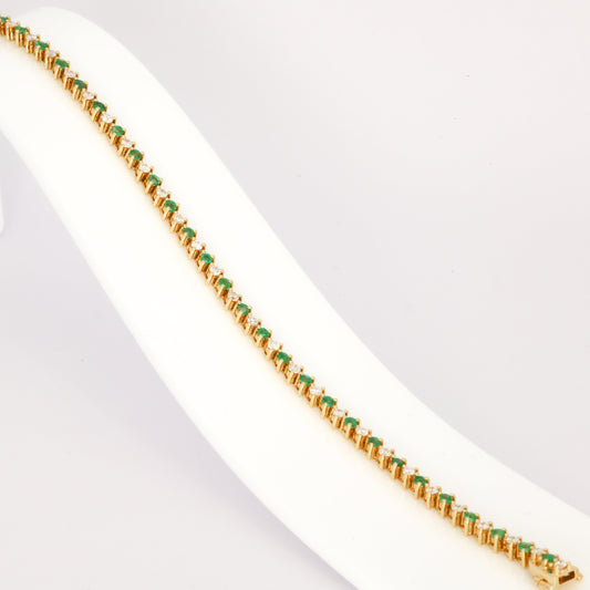 Diamond & emerald tennis bracelet