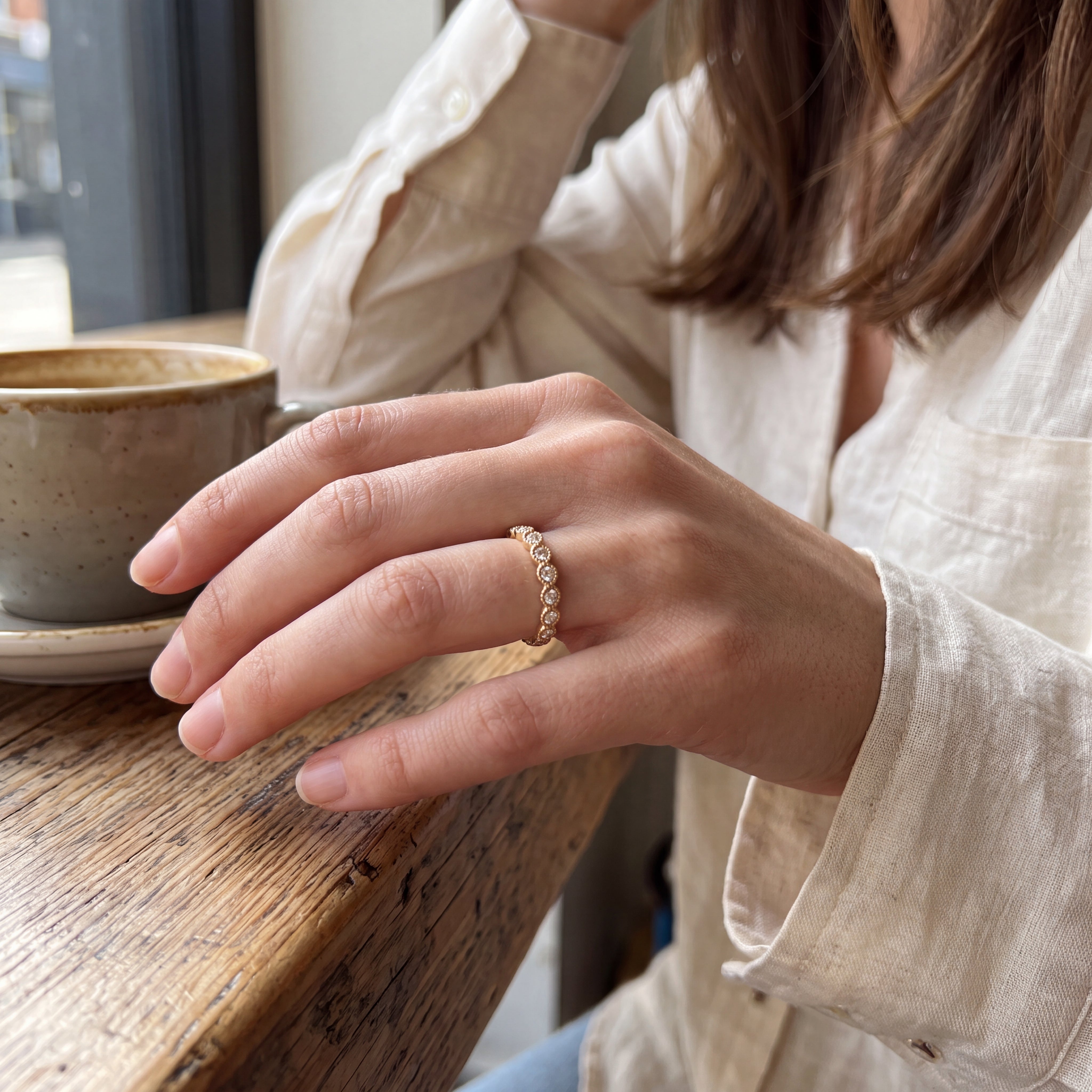 Yellow-Gold-Half-Eternity-Ring-With-Diamonds-on-hand