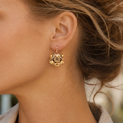liisa vitali kevät gold earrings on woman 