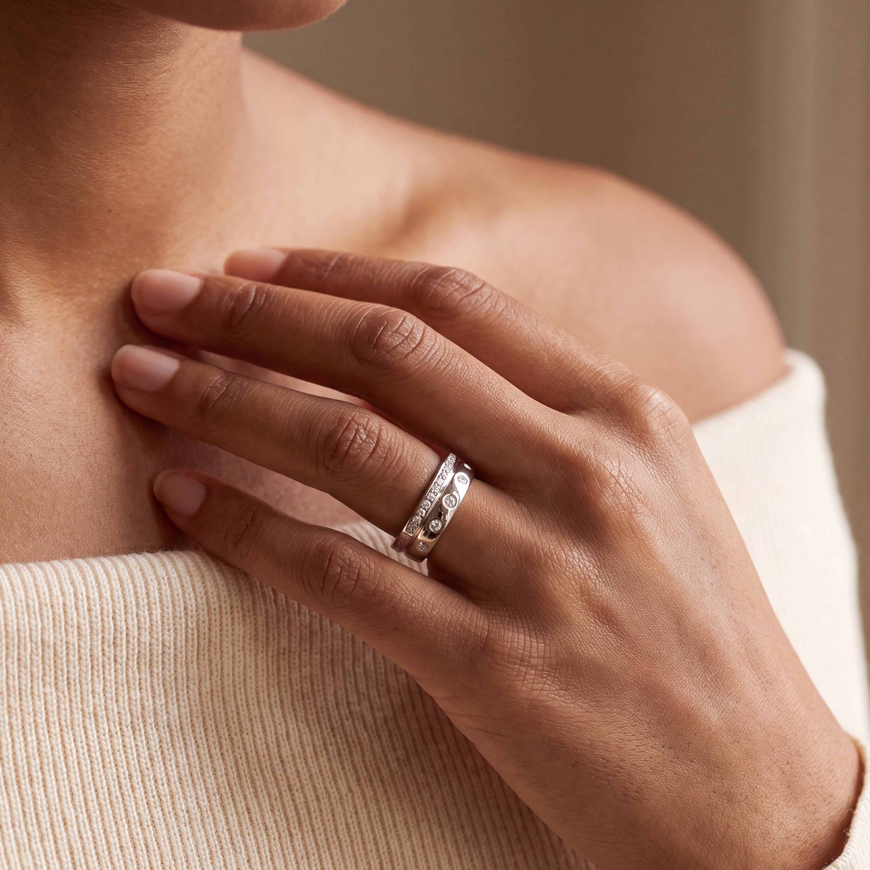 white gold diamond ring on hand 