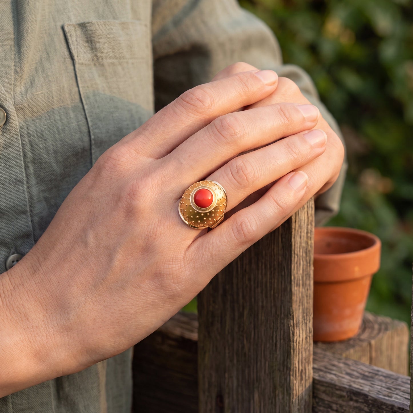 yellow gold coral on hand 