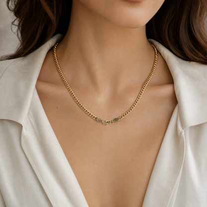 yellow gold curb chain necklace on woman 